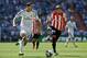 MADRID, SPAIN - SEPTEMBER 01: Angel Di Maria (L) of Real Madrid CF competes for the ball with Mikel Balenziaga of Athletic Club during the La Liga match between Real Madrid CF and Athletic Club de Bilbao at Estadio Santiago Bernabeu on September 1, 2013