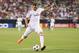 GLENDALE, AZ - AUGUST 01: Karim Benzema #9 of Real Madrid shoots to score a second half goal against the Los Angeles Galaxy during the International Champions Cup match at University of Phoenix Stadium on August 1, 2013 in Glendale, Arizona. (Photo by C