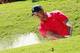 ATLANTA, GA - SEPTEMBER 22: Tiger Woods plays a bunker shot on the first hole during the final round of the TOUR Championship by Coca-Cola at East Lake Golf Club on September 22, 2013 in Atlanta, Georgia. (Photo by Sam Greenwood/Getty Images)
