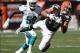 Sep 8, 2013; Cleveland, OH, USA; Cleveland Browns tight end Jordan Cameron (84) makes a catch against Miami Dolphins inside linebacker Dannell Ellerbe (59) during the fourth quarter at FirstEnergy Field. The Dolphins won 23-10. Mandatory Credit: Ron Schwa