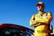 LOUDON, NH - SEPTEMBER 20: Kyle Busch, driver of the #18 M&M's Peanut Butter Toyota, stands by his car after qualifying for the NASCAR Sprint Cup Series Sylvania 300 at New Hampshire Motor Speedway on September 20, 2013 in Loudon, New Hampshire. (Photo