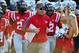 Sep 7, 2013; Oxford, MS, USA; Mississippi Rebels head coach Hugh Freeze leads the team to the field before the game against the Southeast Missouri State Redhawks at Vaught-Hemingway Stadium. Mandatory Credit: Spruce Derden-USA TODAY Sports