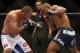 Jun 15, 2013; Winnipeg, MB, Canada; Rashad Evans (right) fights Dan Henderson during their light heavyweight bout at UFC 161 at MTS Centre. Mandatory Credit: Tom Szczerbowski-USA TODAY Sports