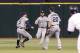 Aug 15, 2013; St. Petersburg, FL, USA; Seattle Mariners shortstop Brad Miller (5), Seattle Mariners second baseman Dustin Ackley (13) and Seattle Mariners second baseman Nick Franklin (20) watch the ball drop for a base hit during the fifth inning against