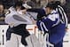 Sep 22, 2013; Toronto, Ontario, CAN; Buffalo Sabres goaltender Ryan Miller (30) and Toronto Maple Leafs goaltender Jonathan Bernier (45) fight during the third period at the Air Canada Centre. Toronto defeated Buffalo 5-3. Mandatory Credit: John E. Sokolo