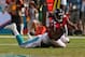 MIAMI GARDENS, FL - SEPTEMBER 22: Roddy White #84 of the Atlanta Falcons is tackled after a catch during a game against the Miami Dolphins at Sun Life Stadium on September 22, 2013 in Miami Gardens, Florida. (Photo by Mike Ehrmann/Getty Images)