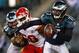 PHILADELPHIA, PA - SEPTEMBER 19: Quarterback Michael Vick #7 of the Philadelphia Eagles looks to run as linebacker Justin Houston #50 of the Kansas City Chiefs pursues during the fourth quarter of a game at Lincoln Financial Field on September 19, 2013 i