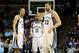 Apr 9, 2013; Memphis, TN, USA; Memphis Grizzlies point guard Mike Conley (11) and small forward Tayshaun Prince (21) and center Marc Gasol (33) talk during the game against the Charlotte Bobcats at FedEx Forum. Mandatory Credit: Spruce DerdenUSA TODAY S