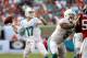 MIAMI GARDENS, FL - SEPTEMBER 22: Quarterback Ryan Tannehill #17 of the Miami Dolphins throws a touchdown pass to Brian Hartline against the Atlanta Falcons at Sun Life Stadium on September 22, 2013 in Miami Gardens, Florida. The Dolphins defeated the Fal