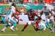 MIAMI GARDENS, FL - SEPTEMBER 22: Harry Douglas #83 of the Atlanta Falcons evades a tackle during a game against the Miami Dolphins at Sun Life Stadium on September 22, 2013 in Miami Gardens, Florida. (Photo by Mike Ehrmann/Getty Images)