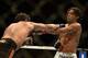 Apr 20, 2013; San Jose, CA, USA; Benson Henderson (right) fights Gilbert Melendez (left) during the lightweight championship bout of the UFC on Fuel TV at HP Pavilion. Mandatory Credit: Kyle Terada-USA TODAY Sports