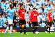 MANCHESTER, ENGLAND - SEPTEMBER 22: Wayne Rooney (2R) and Michael Carrick (2L) of Manchester United look dejected during the Barclays Premier League match between Manchester City and Manchester United at the Etihad Stadium on September 22, 2013 in Manche