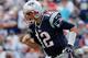 FOXBORO, MA - SEPTEMBER 22: Tom Brady #12 of the New England Patriots reacts after throwing an interception in second half in a game with the Tampa Bay Buccaneers at Gillette Stadium on September 22, 2013 in Foxboro, Massachusetts. (Photo by Jim Rogash/G