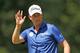 ATLANTA, GA - SEPTEMBER 22: Webb Simpson waves to the gallery after a birdie on the second green during the final round of the TOUR Championship by Coca-Cola at East Lake Golf Club on September 22, 2013 in Atlanta, Georgia. (Photo by Kevin C. Cox/Getty