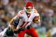 PHILADELPHIA, PA - SEPTEMBER 19: Alex Smith #11 of the Kansas City Chiefs tries to avoid being sacked by Nate Allen #29 of the Philadelphia Eagles in the first quarter at Lincoln Financial Field on September 19, 2013 in Philadelphia, Pennsylvania. (Pho