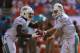 MIAMI GARDENS, FL - SEPTEMBER 22: Ryan Tannehill #17 of the Miami Dolphins hands off to Lamar Miller #26 during a game against the Atlanta Falcons at Sun Life Stadium on September 22, 2013 in Miami Gardens, Florida. (Photo by Mike Ehrmann/Getty Images)