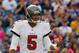 FOXBORO, MA - SEPTEMBER 22: Josh Freeman #5 of the Tampa Bay Buccaneers reacts after throwing an incomplete pass in the second half against the New England Patriots at Gillette Stadium on September 22, 2013 in Foxboro, Massachusetts. (Photo by Jim Rogash