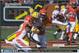 As highlighted by the yellow arrows, Jermichael Finley received a blow to the head that sent him spinning down to his left.