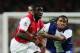 LONDON - SEPTEMBER 26: Kolo Toure (L) of Arsenal holds off Anderson (R) of FC Porto during the UEFA Champions League Group G match between Arsenal and FC Porto at The Emirates Stadium on September 26, 2006 in London, England. (Photo by Phil Cole/Getty I