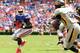 GAINESVILLE, FL - AUGUST 31: Mack Brown #33 of the Florida Gators looks for an opening against the Toledo Rockets during a game at Ben Hill Griffin Stadium on August 31, 2013 in Gainesville, Florida. (Photo by Stacy Revere/Getty Images)