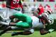ATHENS, GA - SEPTEMBER 21: Reggie Pegram #2 of the North Texas Mean Green is tackled by Jordan Jenkins #59 of the Georgia Bulldogs at Sanford Stadium on September 21, 2013 in Athens, Georgia. (Photo by Scott Cunningham/Getty Images)