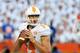 GAINESVILLE, FL - SEPTEMBER 21: Quarterback Justin Worley #14 of the Tennessee Volunteers sets to pass in the 2nd half against the Florida Gators September 21, 2013 at Ben Hill Griffin Stadium at Florida Field in Gainesville, Florida. Florida won 31 - 1