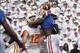 Sep 21, 2013; Gainesville, FL, USA; Florida Gators linebacker Ronald Powell (7) pressures Tennessee Volunteers quarterback Nathan Peterman (12) during the second quarter at Ben Hill Griffin Stadium. Mandatory Credit: Kim Klement-USA TODAY Sports
