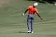 Tiger Woods did this way too often after hitting short approach shots in 2013.