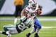 Sep 22, 2013; East Rutherford, NJ, USA; Buffalo Bills running back C.J. Spiller (28) pushes off New York Jets cornerback Kyle Wilson (20) at MetLife Stadium. Mandatory Credit: Robert Deutsch-USA TODAY Sports