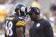 PITTSBURGH, PA - SEPTEMBER 08: Mike Tomlin talks with Kelvin Beachum #68 of the Pittsburgh Steelers in the first half during the game against the Tennessee Titans on September 8, 2013 at Heinz Field in Pittsburgh, Pennsylvania. (Photo by Justin K. Aller