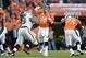 Sep 23, 2013; Denver, CO, USA; Denver Broncos quarterback Peyton Manning (18) throws a pass against the Oakland Raiders at Sports Authority Field at Mile High. Mandatory Credit: Kirby Lee-USA TODAY Sports