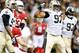 Sep 22, 2013; New Orleans, LA, USA; New Orleans Saints defensive end Glenn Foster (97) celebrates with the defense following a sack against the Arizona Cardinals during the second half of a game at Mercedes-Benz Superdome. The Saints defeated the Cardinal