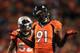 DENVER, CO - SEPTEMBER 23: Robert Ayers #91 of the Denver Broncos celebrates sacking Terrelle Pryor #2 of the Oakland Raiders in the second quarter at Sports Authority Field at Mile High on September 23, 2013 in Denver, Colorado. (Photo by Doug Pensin