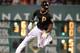 PITTSBURGH, PA - SEPTEMBER 21: Andrew McCutchen #22 of the Pittsburgh Pirates goes from first to third base on a botched pick-off attempt against the Cincinnati Reds during the sixth inning of their game on September 21, 2013 at PNC Park in Pittsburgh Pe