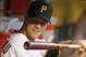 Sep 18, 2013; Pittsburgh, PA, USA; Pittsburgh Pirates first baseman Justin Morneau (66) in the dugout before playing the San Diego Padres at PNC Park. Mandatory Credit: Charles LeClaire-USA TODAY Sports