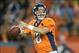 Sep 23, 2013; Denver, CO, USA; Denver Broncos quarterback Peyton Manning (17) throws a pass against the Oakland Raiders at Sports Authority Field at Mile High. Mandatory Credit: Kirby Lee-USA TODAY Sports