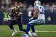 ARLINGTON, TX - SEPTEMBER 22: Isaiah Pead #24 of the St. Louis Rams runs the ball against Brandon Carr #39 of the Dallas Cowboys at AT&T Stadium on September 22, 2013 in Arlington, Texas. (Photo by Ronald Martinez/Getty Images)
