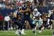 ARLINGTON, TX - SEPTEMBER 22: Sam Bradford #8 of the St. Louis Rams throws against the Dallas Cowboys at AT&T Stadium on September 22, 2013 in Arlington, Texas. (Photo by Ronald Martinez/Getty Images)