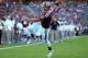 Sep 21, 2013; College Station, TX, USA; Texas A&M Aggies quarterback Johnny Manziel (2) runs for a touchdown against the SMU Mustangs in the first half at Kyle Field. Mandatory Credit: Mark J. Rebilas-USA TODAY Sports