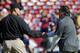 Harbaugh (left) and Fisher.