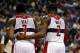 March 3, 2013; Washington, DC, USA; Washington Wizards point guard John Wall (2) talks with Wizards shooting guard Bradley Beal (3) against the Philadelphia 76ers in the fourth quarter at Verizon Center. The Wizards won 90-87. Mandatory Credit: Geoff Burk