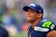 SEATTLE, WA - SEPTEMBER 22: Quarterback Russell Wilson #3 of the Seattle Seahawks watches from the sidelines as the clock winds down during the fourth quarter of the game against the Jacksonville Jaguars at CenturyLink Field on September 22, 2013 in Seatt