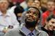 Apr 3, 2013; Portland, OR, USA; Portland Trail Blazers former center Greg Oden smiles while watching the Trail Blazers play against the Memphis Grizzlies at the Rose Garden. Mandatory Credit: Craig Mitchelldyer-USA TODAY Sports