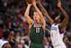 Mar 27, 2013; Philadelphia, PA, USA; Milwaukee Bucks forward Mike Dunleavy (17) shoots a jump shot under pressure from Philadelphia 76ers forward Dorell Wright (4) during the fourth quarter at the Wells Fargo Center. The Sixers defeated the Bucks 100-92.