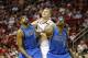 Dec 8, 2012; Houston, TX, USA; Dallas Mavericks shooting guard Vince Carter (25) and center Bernard James (5) box out Houston Rockets center Cole Aldrich (31) in the third quarter at the Toyota Center. The Mavericks defeated the Rockets 116-109. Mandatory