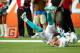 MIAMI GARDENS, FL - SEPTEMBER 22: Receiver Brian Hartline #82 of the Miami Dolphins catches a touchdown against the Atlanta Falcons at Sun Life Stadium on September 22, 2013 in Miami Gardens, Florida. The Dolphins defeated the Falcons 27-23. (Photo by Ma
