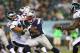 PHILADELPHIA, PA - AUGUST 09: LeGarrette Blount #29 of the New England Patriots carries the ball as Jake Knott #54 of the Philadelphia Eagles defends on August 9, 2013 at Lincoln Financial Field in Philadelphia, Pennslyvania. (Photo by Elsa/Getty Image