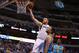 Apr 17, 2013; Dallas, TX, USA; Dallas Mavericks center Chris Kaman (35) shoots against New Orleans Hornets forward Ryan Anderson (33) at American Airlines Center. Mandatory Credit: Matthew Emmons-USA TODAY Sports