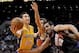 Mar 18, 2013; Phoenix, AZ, USA; Los Angeles Lakers guard Steve Nash (10) handles the ball against Phoenix Suns guard Goran Dragic (1) and center Hamed Haddadi (98) in the first half at US Airways Center. Mandatory Credit: Jennifer Stewart-USA TODAY Sports