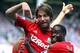 LONDON, ENGLAND - AUGUST 18: Michu of Swansea celebrates scoring the opening goal during the Barclays Premier League match between Queens Park Rangers and Swansea City at Loftus Road on August 18, 2012 in London, England. (Photo by Richard Heathcote/Get